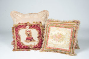 pink embroidered pillows for home staging